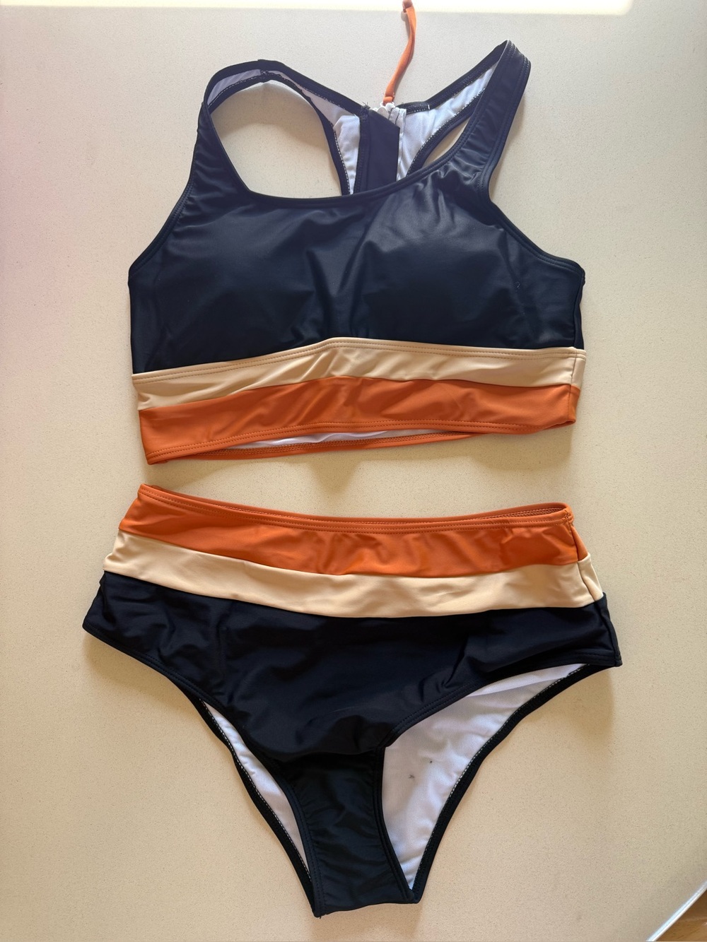 Women’s two-piece swimsuit never worn new condition size medium.